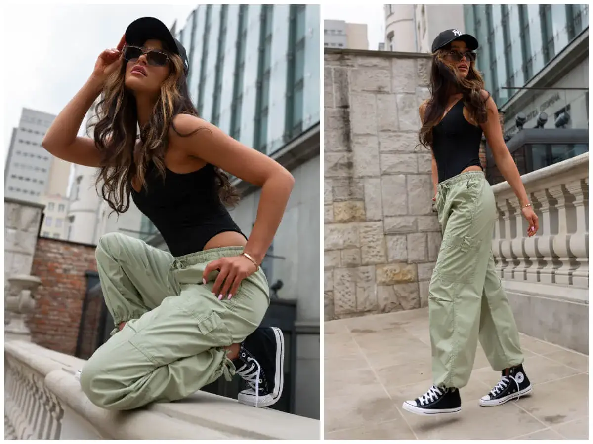 Spodnie cargo damskie stylizacje: luźne, pistacjowe spodnie cargo i czarny top tworzą modny miejski look.